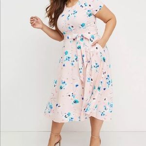 The iconic Lena dress with a high-low hem.